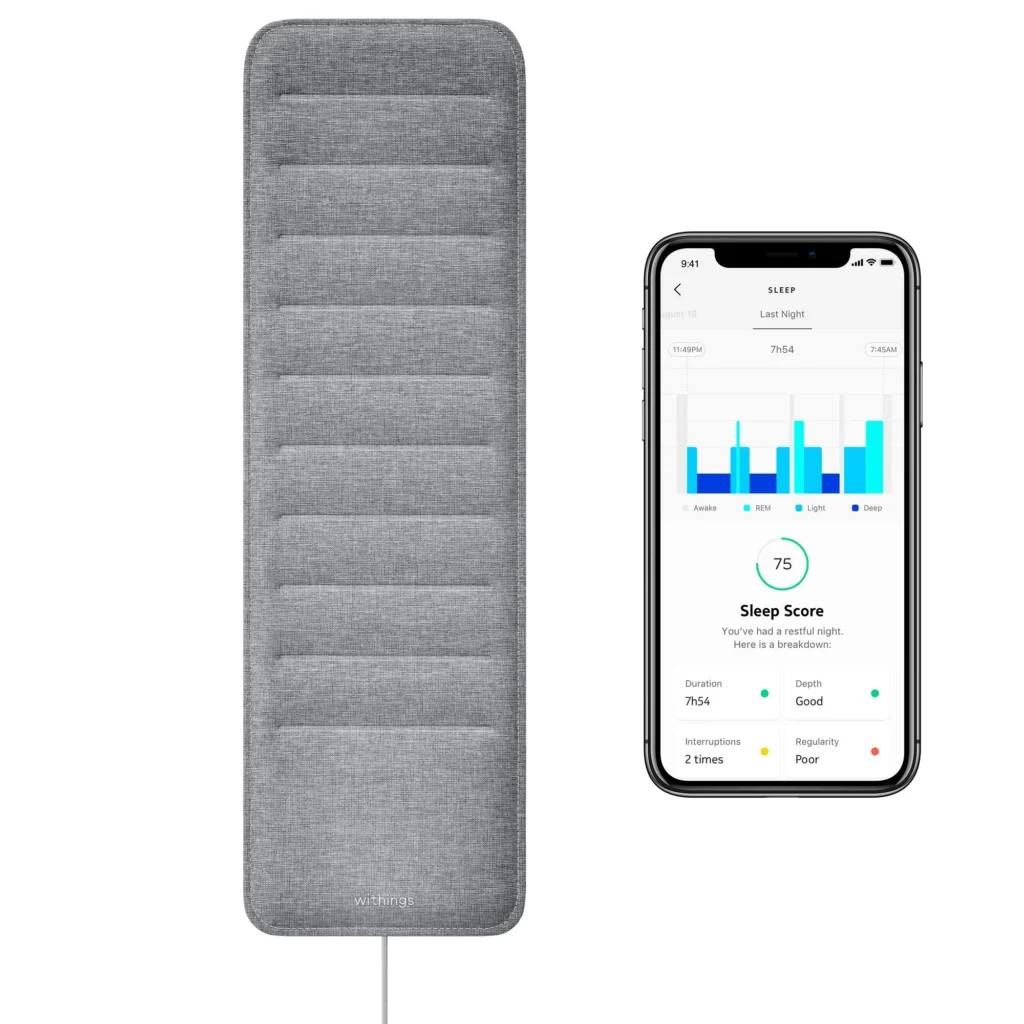 Under-Mattress Sleep Tracking Pad with App Sleep Score Under-mattress sleep tracking pad connected to a smartphone app displaying sleep stages, duration, interruptions, and overall sleep score.