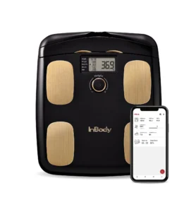 inbody-h20n-smart-scale-body-composition InBody H20N smart scale with gold electrode sensors and companion mobile app displaying body composition metrics.